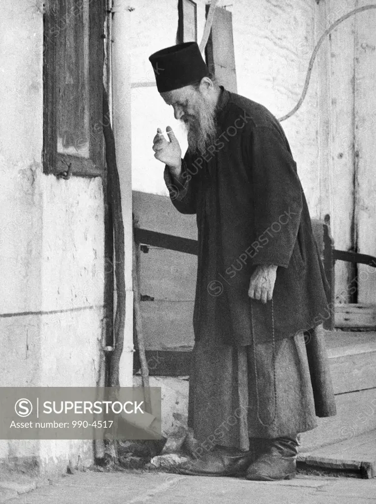 Side profile of a senior man praying, Greece