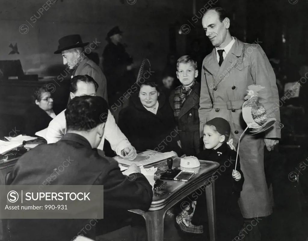 Group of people in an immigration office, Ellis Island, New York City, New York, USA