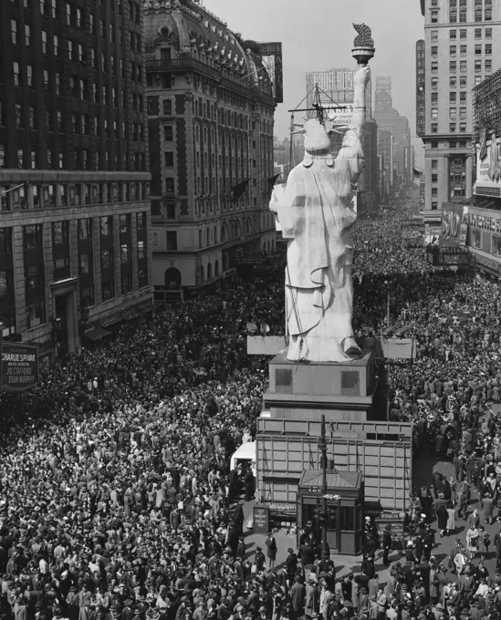 High angle view of crowd around a statue, VE Day, New York City, New York, USA